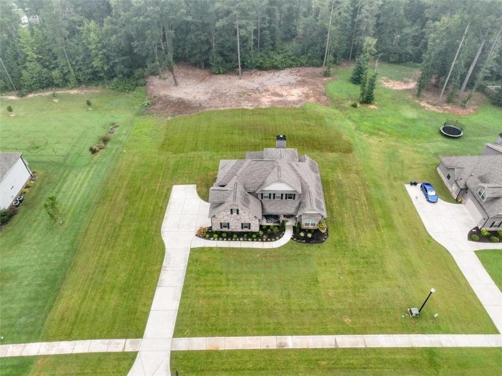 5 bedroom, 4 bathroom, 3,200 sq ft single family residence for sale at 90 Timber Drive, Forsyth, GA 31029 — photo 6