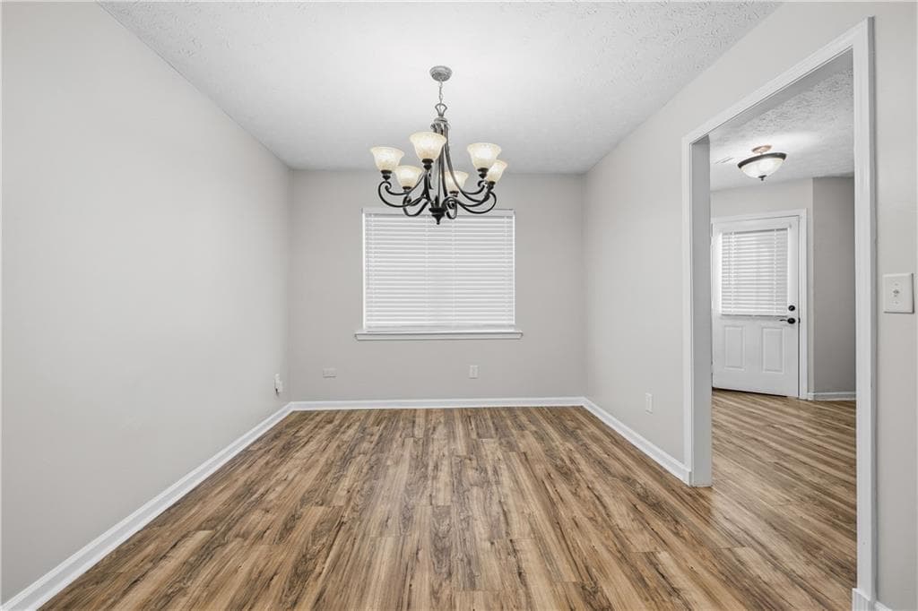 4 bedroom, 3 bathroom, 1,923 sq ft single family residence for sale at 5527 Tunbridge Wells Road, Lithonia, GA 30058 — photo 6