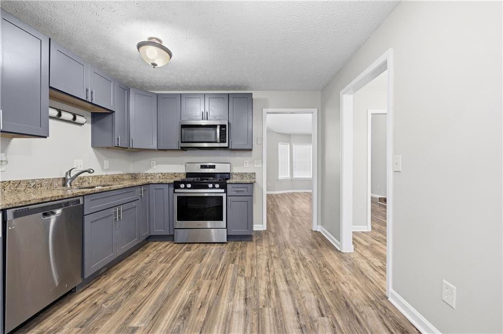 4 bedroom, 3 bathroom, 1,923 sq ft single family residence for sale at 5527 Tunbridge Wells Road, Lithonia, GA 30058 — photo 8