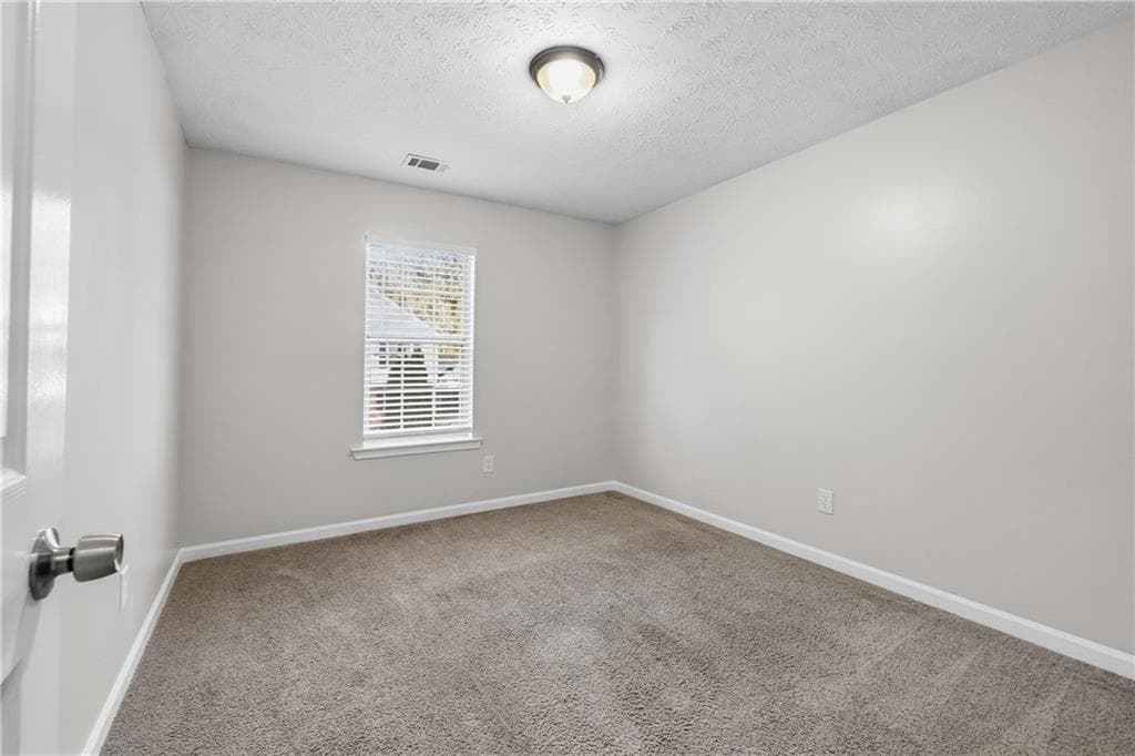 4 bedroom, 3 bathroom, 1,923 sq ft single family residence for sale at 5527 Tunbridge Wells Road, Lithonia, GA 30058 — photo 9