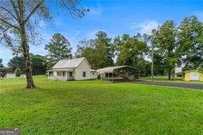 3 bedroom, 1 bathroom, 1,196 sq ft single family residence for sale at 5705 P W A Drive, Cumming, GA 30041 — photo 2