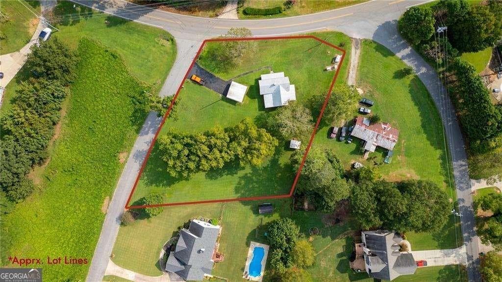 3 bedroom, 1 bathroom, 1,196 sq ft single family residence for sale at 5705 P W A Drive, Cumming, GA 30041 — photo 3