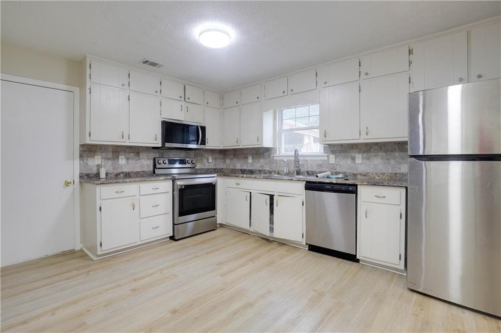 3 bedroom, 3 bathroom, 1,504 sq ft single family residence for rent at 4131 Gravitt Place, Duluth, GA 30096 for $2,000 a month — photo 7