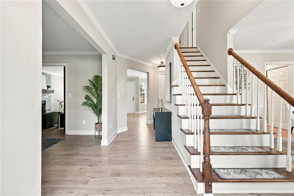 4 bedroom, 3 bathroom, 2,746 sq ft single family residence for sale at 690 Ruxbury Court, Suwanee, GA 30024 — photo 2