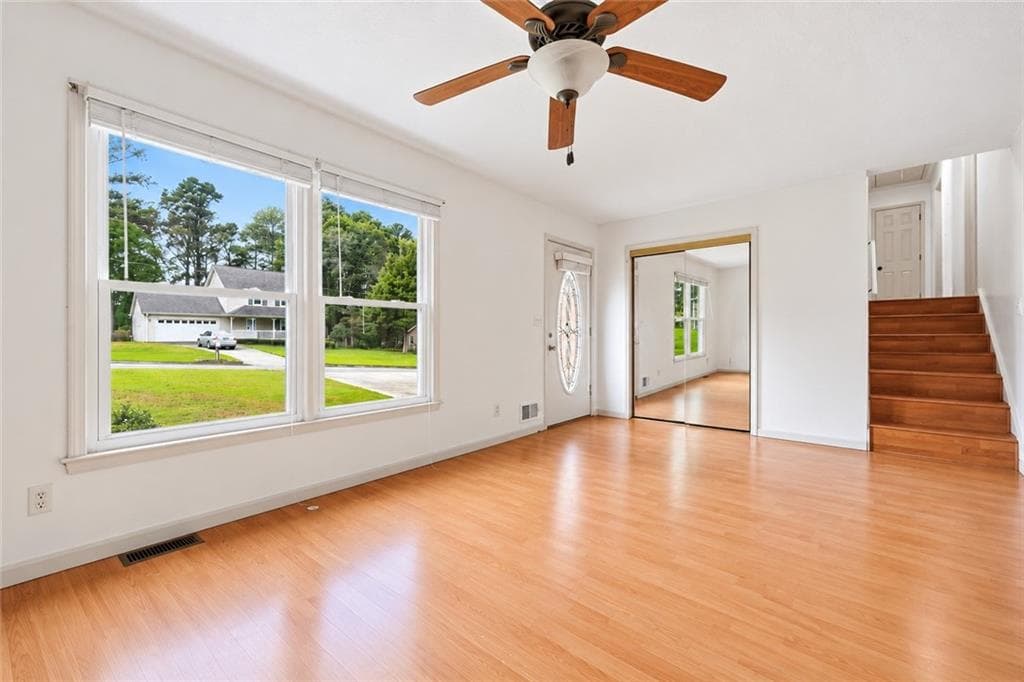 5 bedroom, 2 bathroom, 1,676 sq ft single family residence for sale at 1668 Woodsong Court, Grayson, GA 30017 — photo 2