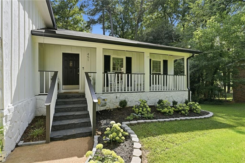 4 bedroom, 3 bathroom, 2,116 sq ft single family residence for sale at 451 Little John Dr, Lilburn, GA 30047 — photo 2