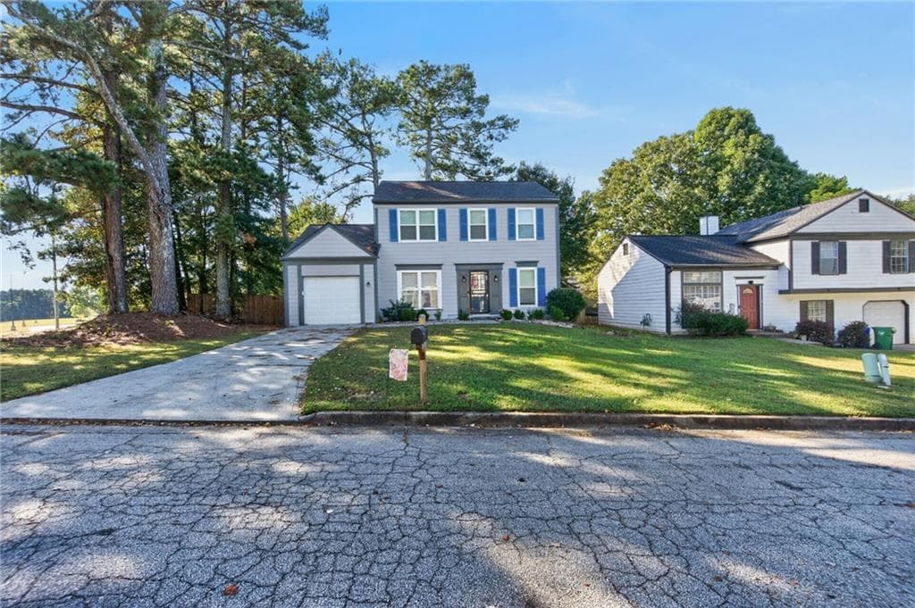 3 bedroom, 3 bathroom, 1,552 sq ft single family residence for sale at 6303 Marbut Farms Road, Lithonia, GA 30058 — photo 2