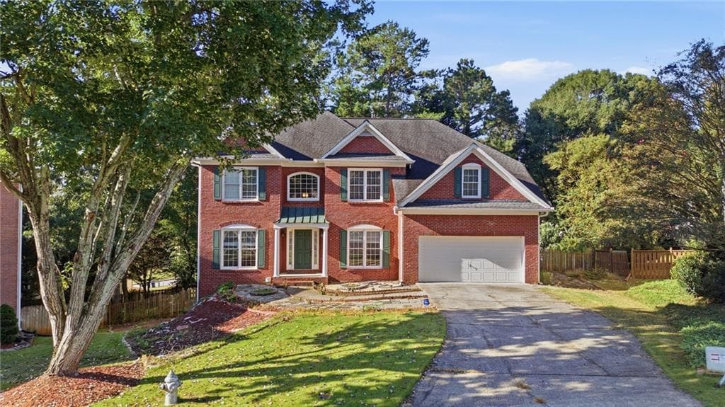 5 bedroom, 4 bathroom, 4,663 sq ft single family residence for sale at 1832 Shores Ridge Court, Suwanee, GA 30024 — photo 1 of 48