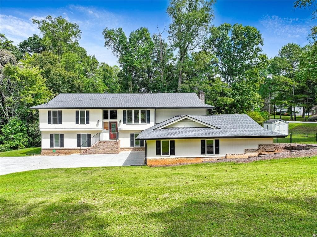 4 bedroom, 3 bathroom, 2,674 sq ft single family residence for sale at 2026 Crescent Drive, Snellville, GA 30078 — photo 1 of 40