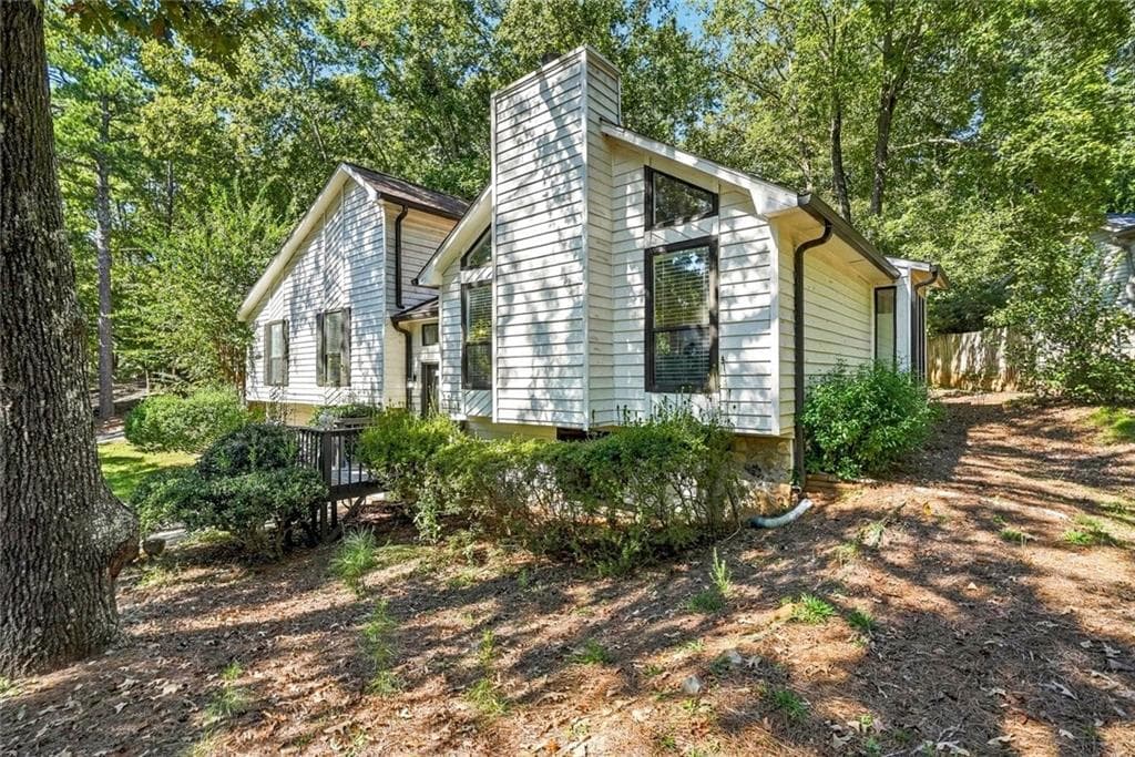 3 bedroom, 2 bathroom, 2,497 sq ft single family residence for sale at 8555 Colony Club Drive, Alpharetta, GA 30022 — photo 2
