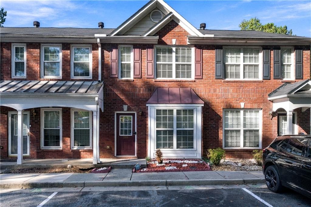 2 bedroom, 3 bathroom, 1,256 sq ft townhouse for rent at 310 Paden Cove Trail, Lawrenceville, GA 30044 for $2,100 a month — photo 1 of 14
