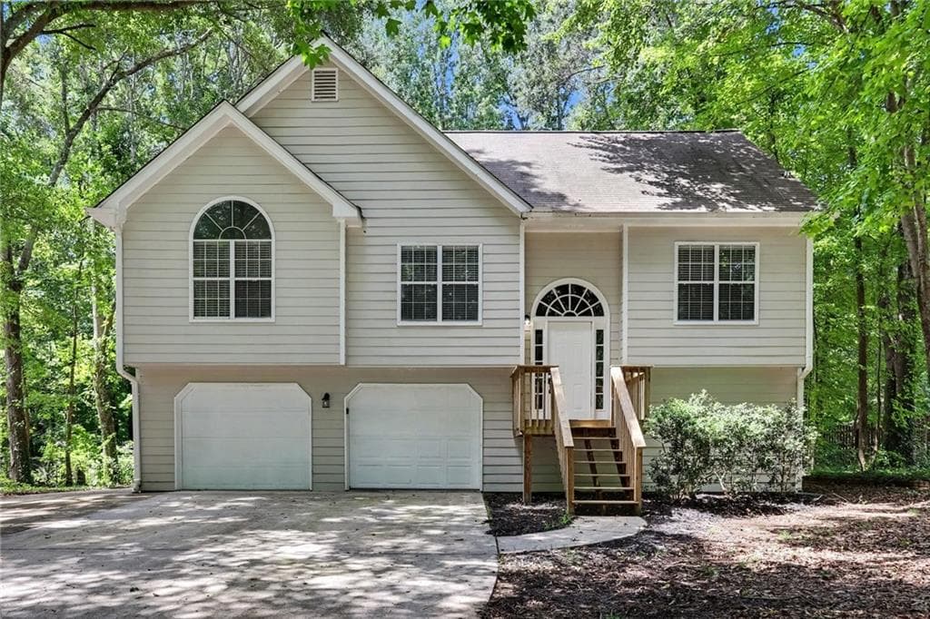 4 bedroom, 3 bathroom, 1,315 sq ft single family residence for sale at 5920 Rolling Oaks Drive, Cumming, GA 30040