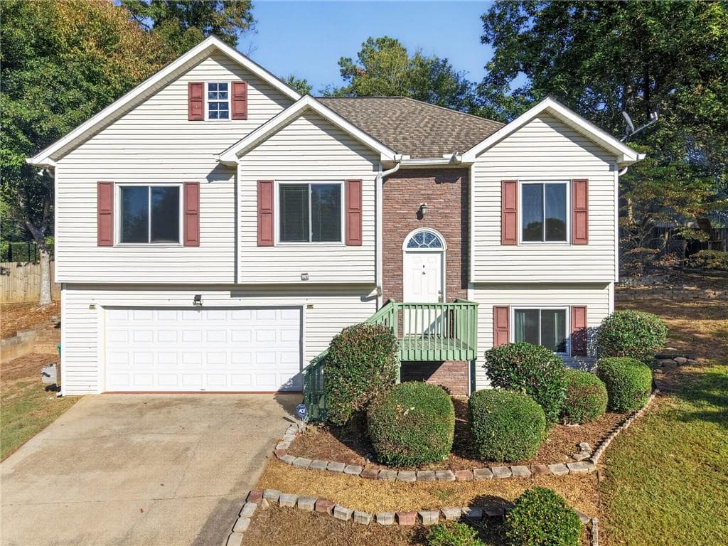 3 bedroom, 2 bathroom, 1,990 sq ft single family residence for sale at 1038 Whispering Woods Drive, Canton, GA 30114