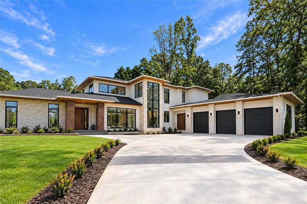 5 bedroom, 8 bathroom, 6,704 sq ft single family residence for sale at 4785 Moore Road, Suwanee, GA 30024 — photo 1 of 23