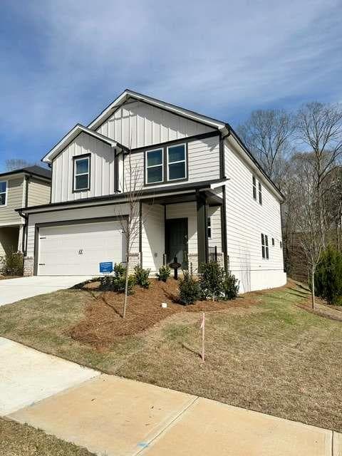 5 bedroom, 3 bathroom, 2,420 sq ft single family residence for sale at 104 NESBIT Drive, Holly Springs, GA 30114 — photo 2