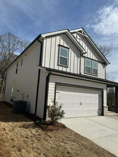 5 bedroom, 3 bathroom, 2,420 sq ft single family residence for sale at 104 NESBIT Drive, Holly Springs, GA 30114 — photo 3