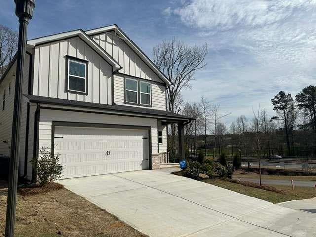 5 bedroom, 3 bathroom, 2,420 sq ft single family residence for sale at 104 NESBIT Drive, Holly Springs, GA 30114 — photo 4