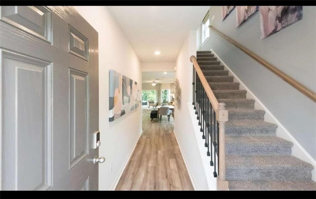 5 bedroom, 3 bathroom, 2,420 sq ft single family residence for sale at 104 NESBIT Drive, Holly Springs, GA 30114 — photo 6