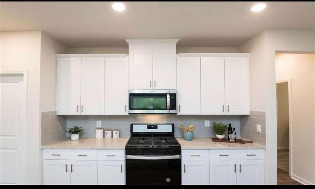 5 bedroom, 3 bathroom, 2,420 sq ft single family residence for sale at 104 NESBIT Drive, Holly Springs, GA 30114 — photo 8