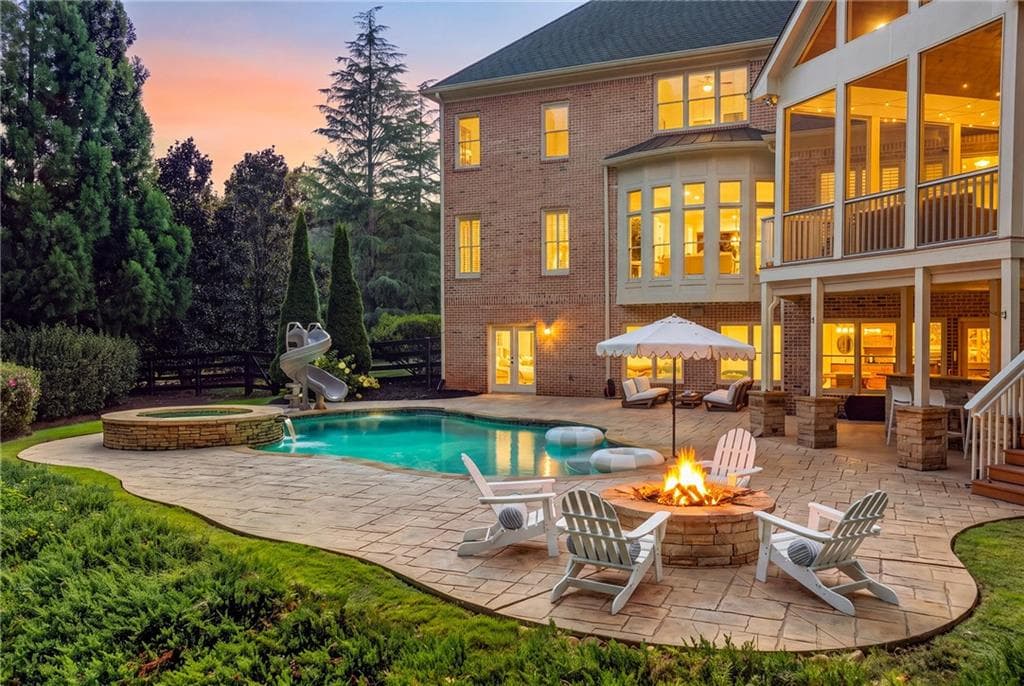 6 bedroom, 7 bathroom, 6,753 sq ft single family residence for sale at 14049 Triple Crown Drive, Milton, GA 30004 — photo 2