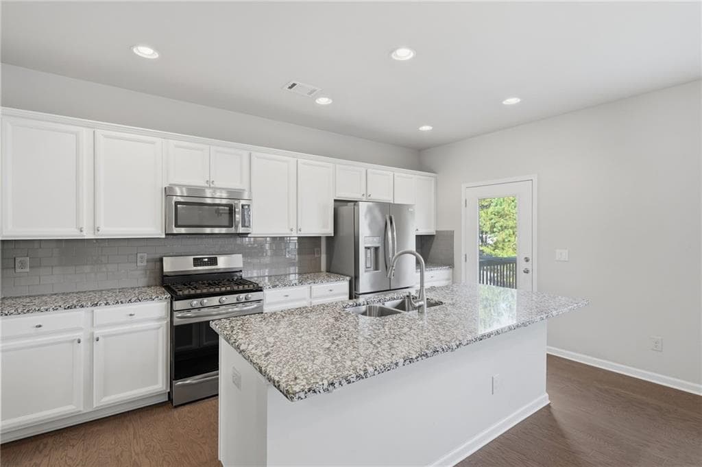 4 bedroom, 3 bathroom, 2,336 sq ft single family residence for sale at 4125 Spring Ridge Drive, Cumming, GA 30028 — photo 9