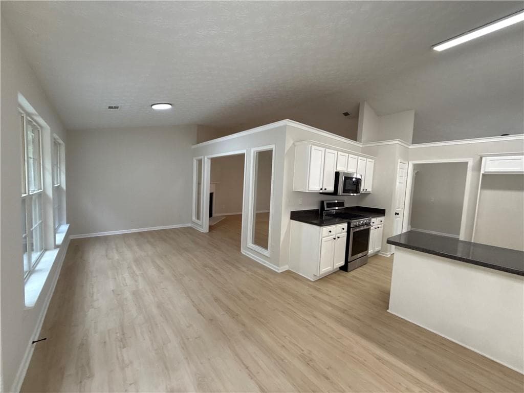 3 bedroom, 2 bathroom, 2,390 sq ft single family residence for sale at 180 Meadowbrook Court, Covington, GA 30016 — photo 4