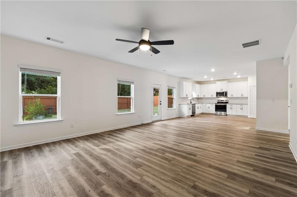 4 bedroom, 3 bathroom, 2,556 sq ft single family residence for sale at 3955 Saddle Bag Court, Dacula, GA 30019 — photo 5