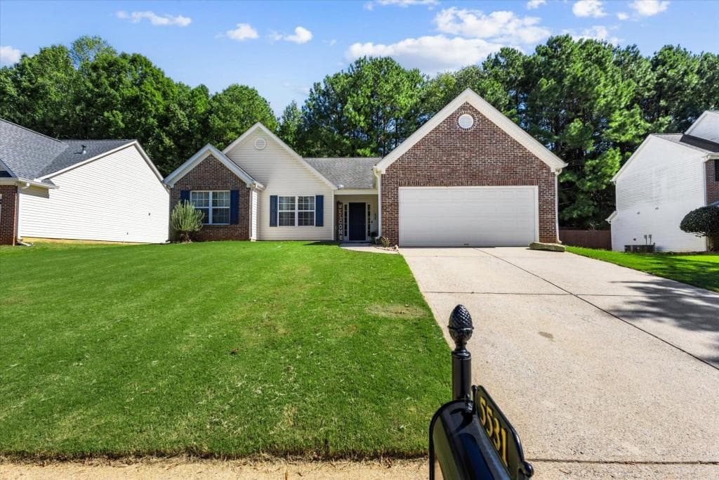 3 bedroom, 2 bathroom, 1,850 sq ft single family residence for sale at 5531 Skylar Creek Lane, Buford, GA 30518 — photo 4