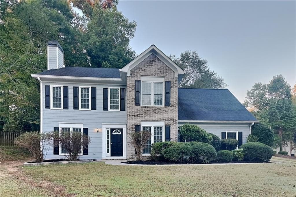 3 bedroom, 3 bathroom, 1,823 sq ft single family residence for rent at 7115 Big Woods Drive, Woodstock, GA 30189 for $2,250 a month — photo 1 of 18