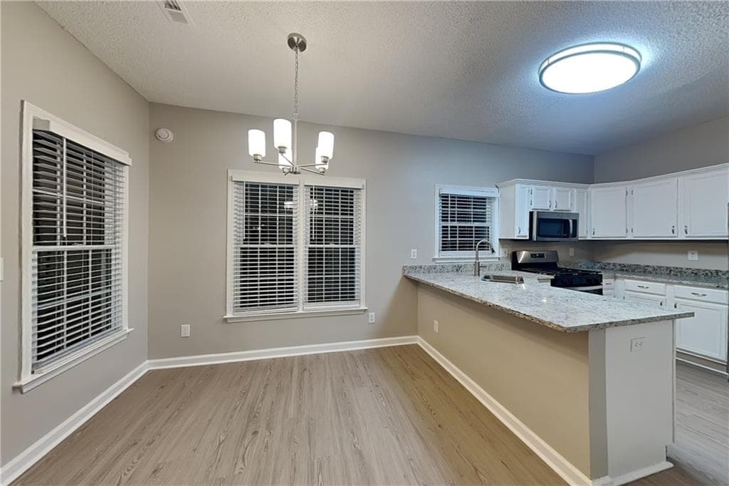 3 bedroom, 3 bathroom, 1,823 sq ft single family residence for rent at 7115 Big Woods Drive, Woodstock, GA 30189 for $2,250 a month — photo 6