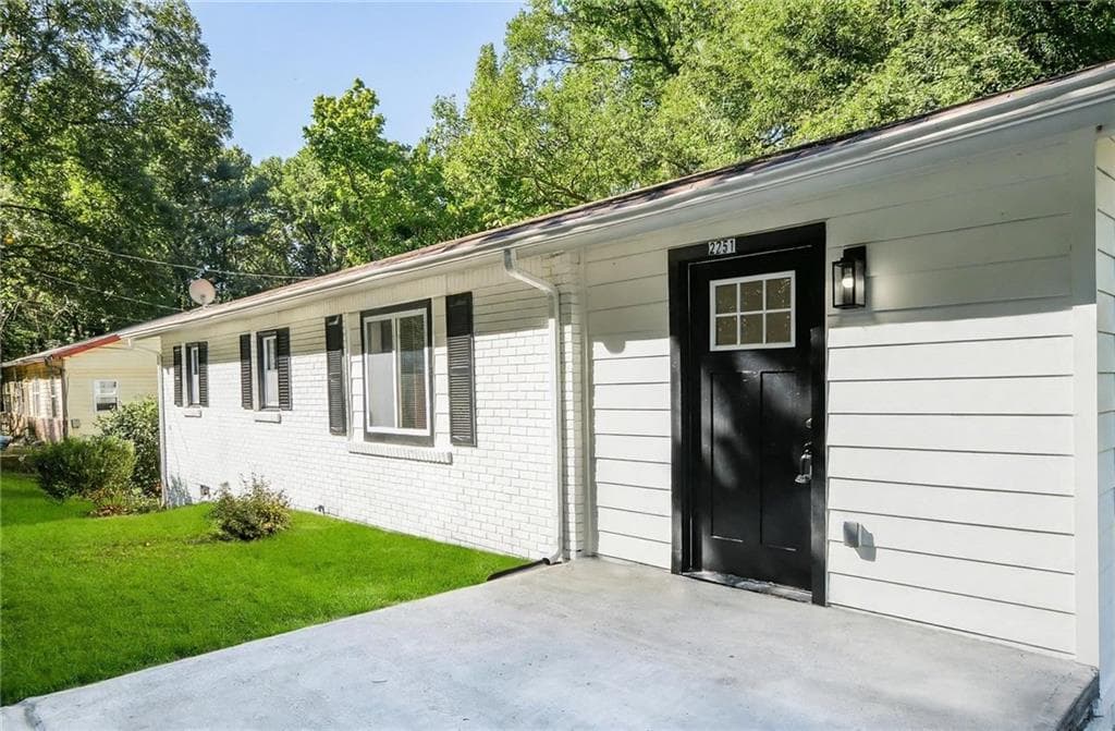 3 bedroom, 2 bathroom, 1,122 sq ft single family residence for sale at 2751 Cagle Street, Lithonia, GA 30058 — photo 2