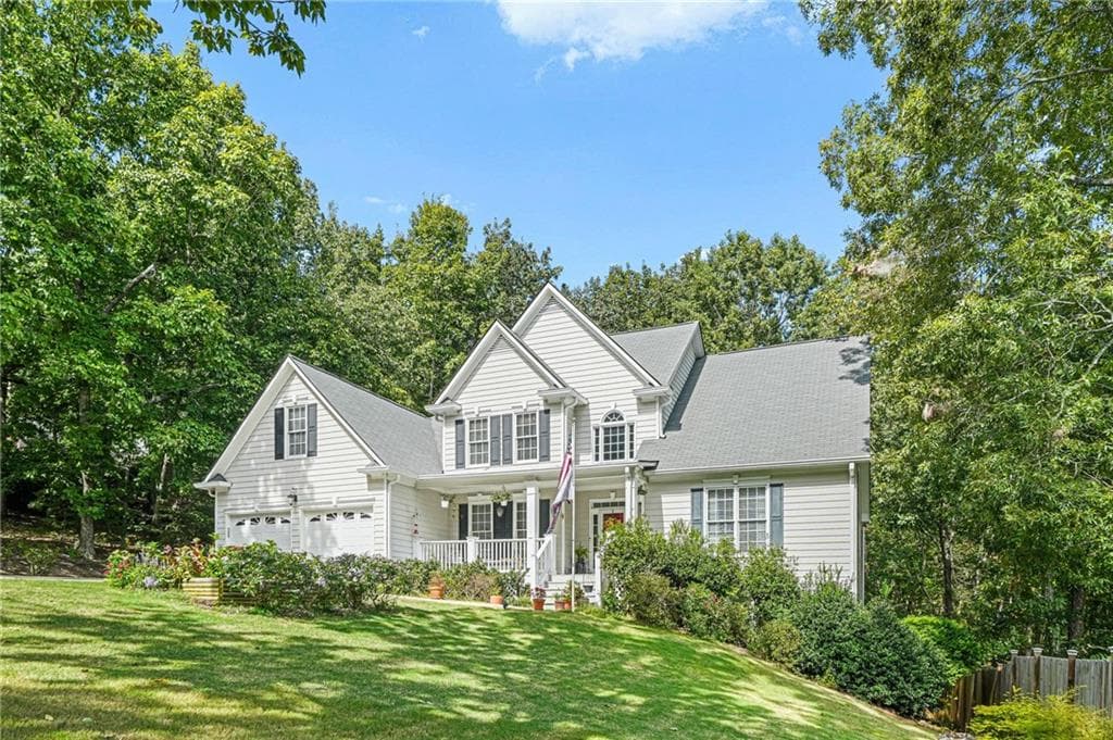 5 bedroom, 4 bathroom, 3,940 sq ft single family residence for sale at 1899 Barnes Mill Road, Marietta, GA 30062 — photo 2