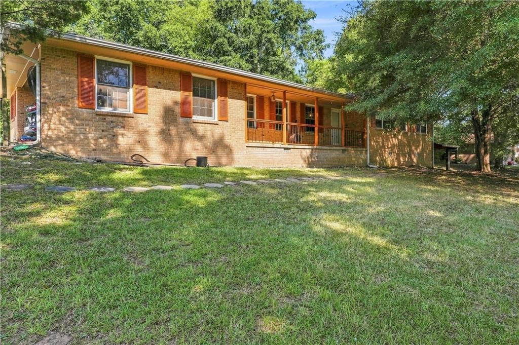 4 bedroom, 3 bathroom, 1,978 sq ft single family residence for sale at 6828 Rockland Road, Lithonia, GA 30038 — photo 1 of 52
