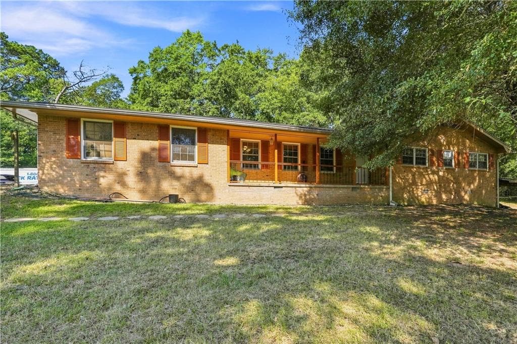 4 bedroom, 3 bathroom, 1,978 sq ft single family residence for sale at 6828 Rockland Road, Lithonia, GA 30038 — photo 2