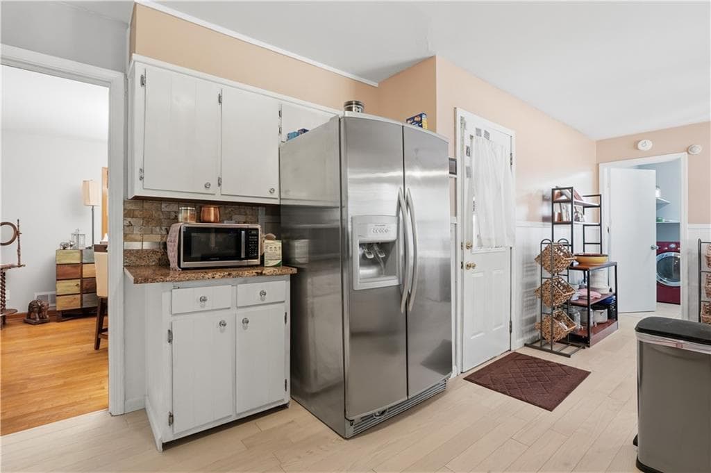 4 bedroom, 3 bathroom, 1,978 sq ft single family residence for sale at 6828 Rockland Road, Lithonia, GA 30038 — photo 6