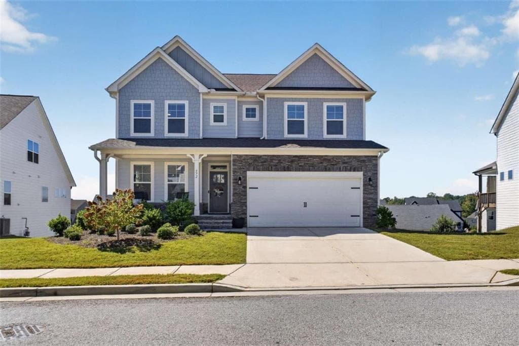 5 bedroom, 3 bathroom, 3,176 sq ft single family residence for sale at 572 Redfish Way, Hoschton, GA 30548 — photo 1 of 47