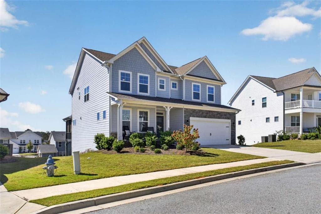 5 bedroom, 3 bathroom, 3,176 sq ft single family residence for sale at 572 Redfish Way, Hoschton, GA 30548 — photo 2