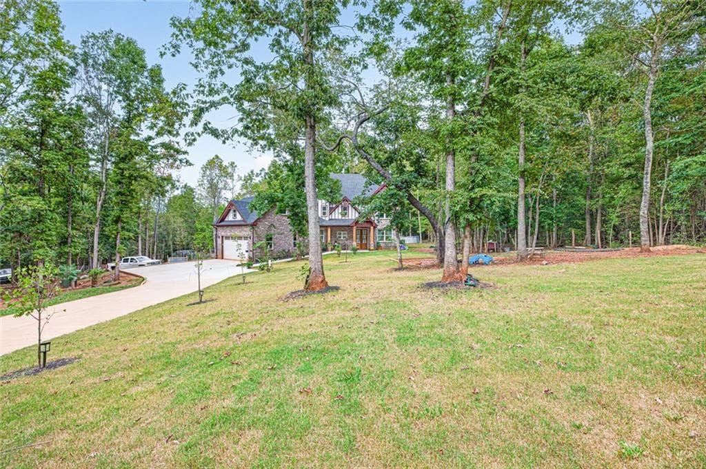 5 bedroom, 4 bathroom, 4,136 sq ft single family residence for sale at 339 Jennings Lane, Nicholson, GA 30565 — photo 2