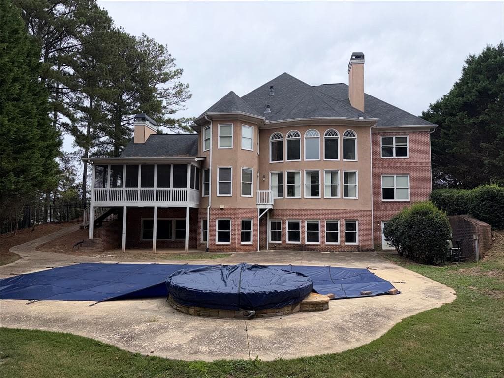 5 bedroom, 6 bathroom, 6,147 sq ft single family residence for sale at 602 Talmadge Lane, Canton, GA 30115 — photo 2