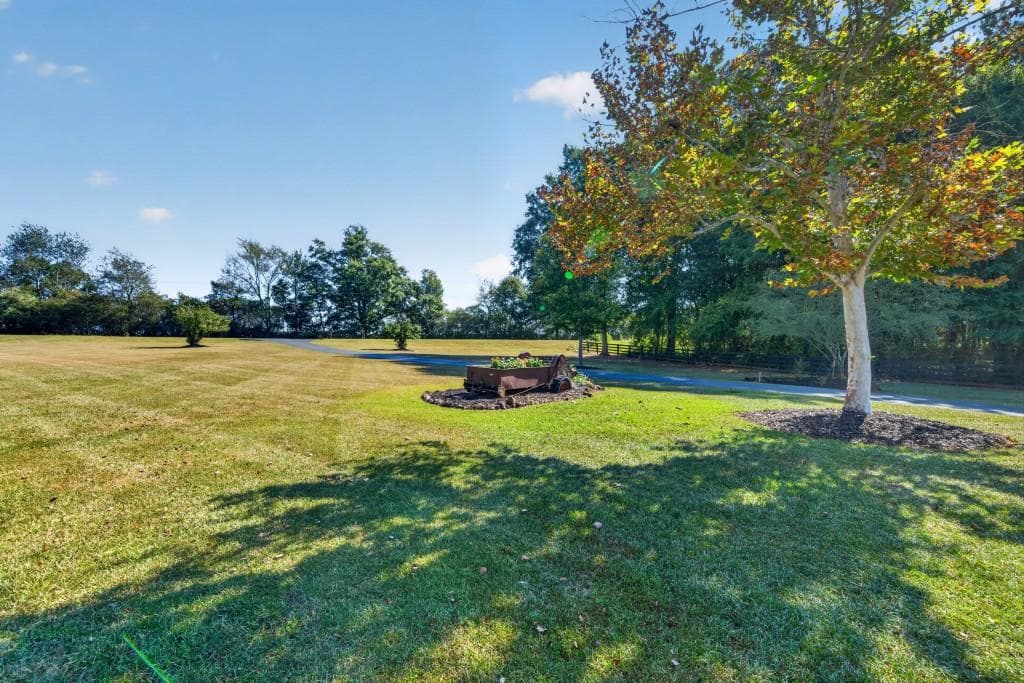 4 bedroom, 4 bathroom, 3,435 sq ft single family residence for sale at 2030 Aqua Road, Madison, GA 30650 — photo 5