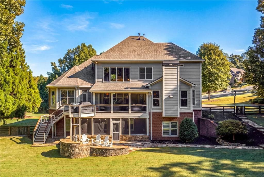 6 bedroom, 6 bathroom, 6,324 sq ft single family residence for sale at 14640 Timber Point, Milton, GA 30004 — photo 2