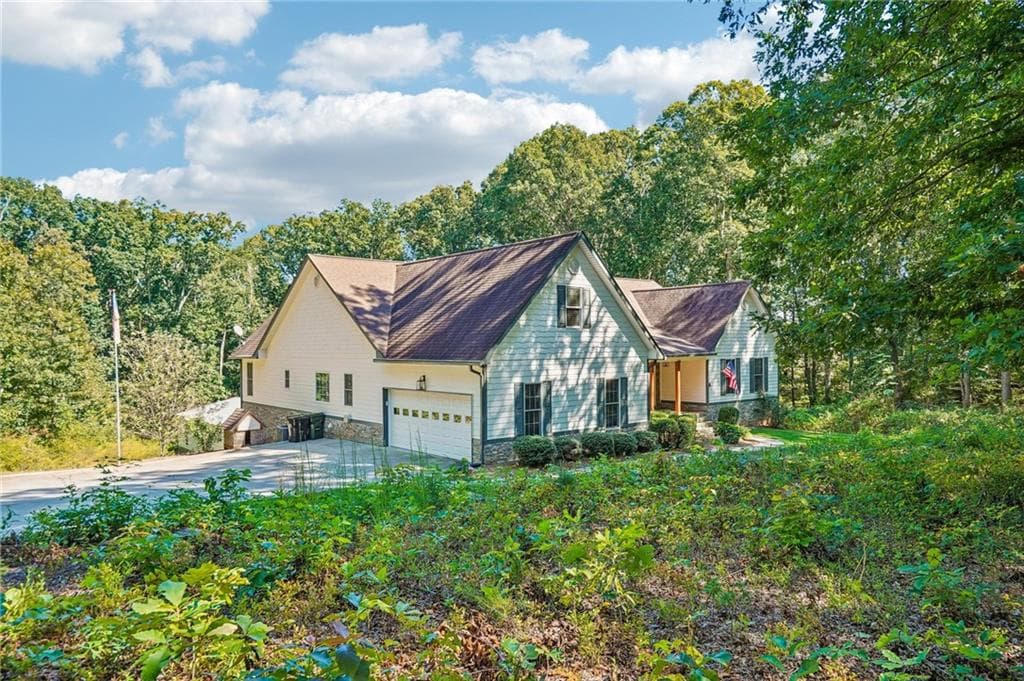 6 bedroom, 4 bathroom, 6,048 sq ft single family residence for sale at 5925 Cantrell Circle, Cumming, GA 30041