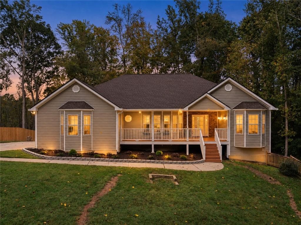 4 bedroom, 3 bathroom, 3,860 sq ft single family residence for sale at 7435 Ivy Grove Street, Cumming, GA 30040 — photo 3