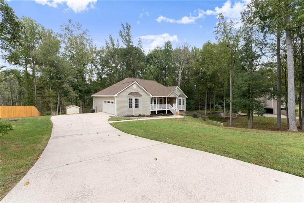 4 bedroom, 3 bathroom, 3,860 sq ft single family residence for sale at 7435 Ivy Grove Street, Cumming, GA 30040 — photo 6