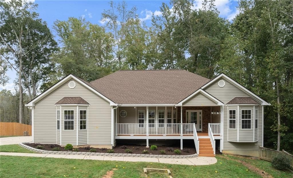4 bedroom, 3 bathroom, 3,860 sq ft single family residence for sale at 7435 Ivy Grove Street, Cumming, GA 30040