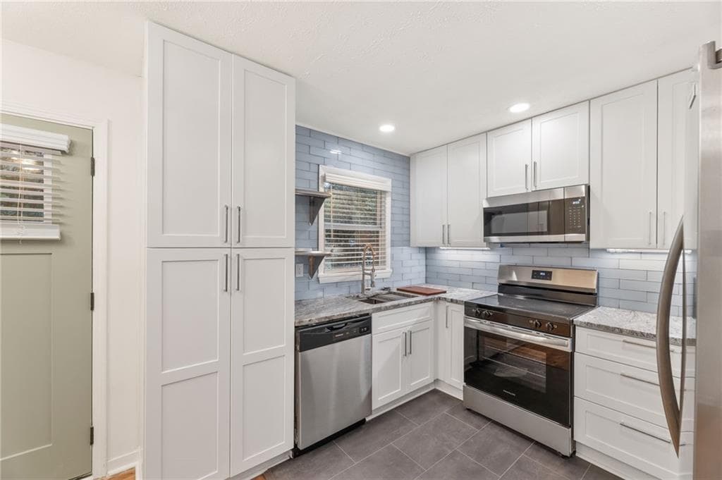 4 bedroom, 3 bathroom, 1,095 sq ft single family residence for sale at 876 Bolton Place, Atlanta, GA 30331 — photo 10