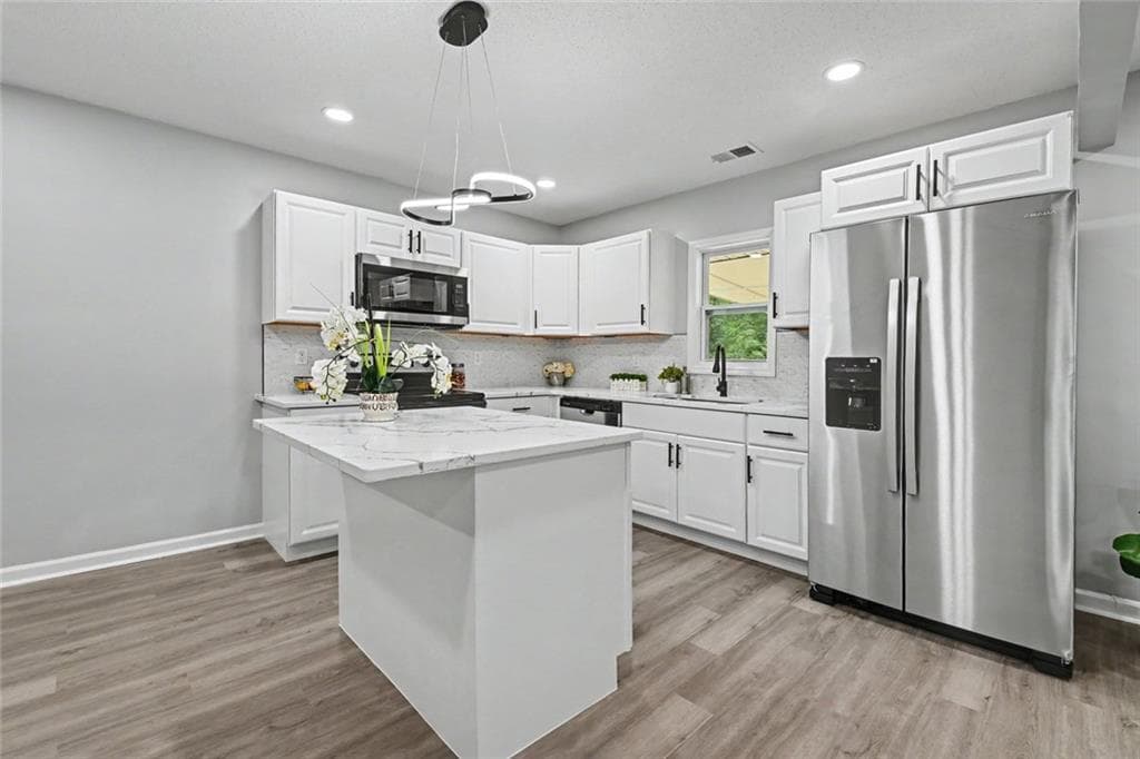 3 bedroom, 2 bathroom, 1,050 sq ft single family residence for sale at 2676 Beacon Drive, Atlanta, GA 30349 — photo 6