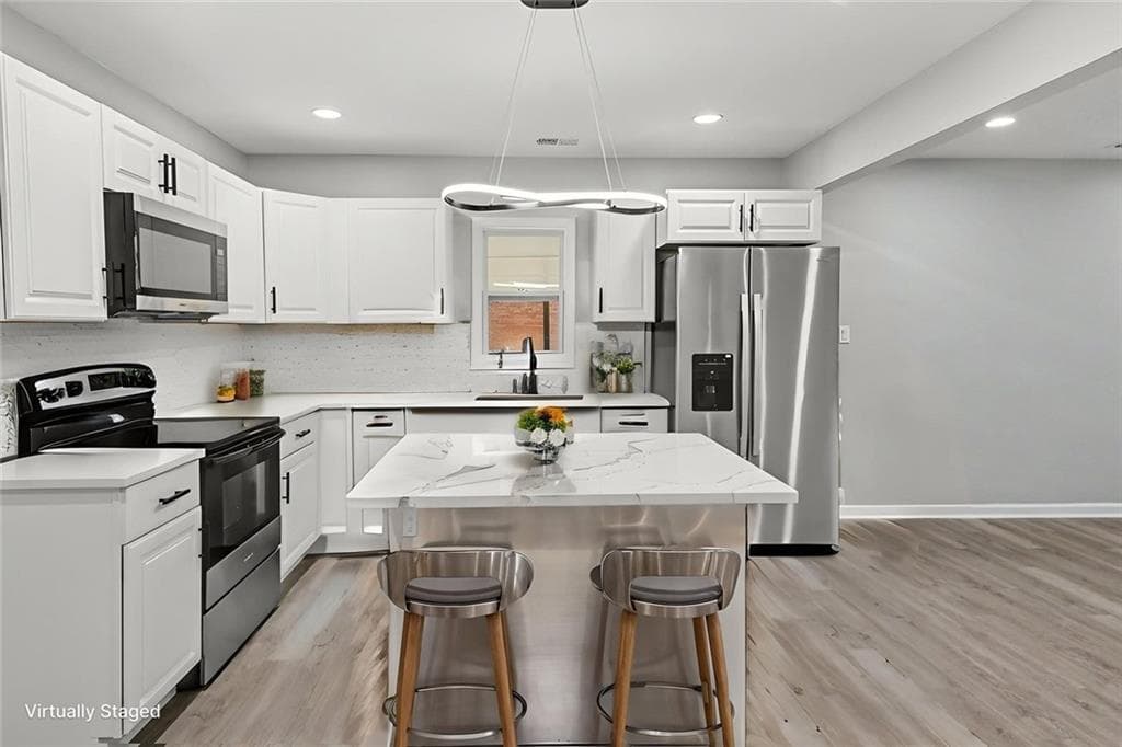 3 bedroom, 2 bathroom, 1,050 sq ft single family residence for sale at 2676 Beacon Drive, Atlanta, GA 30349 — photo 7