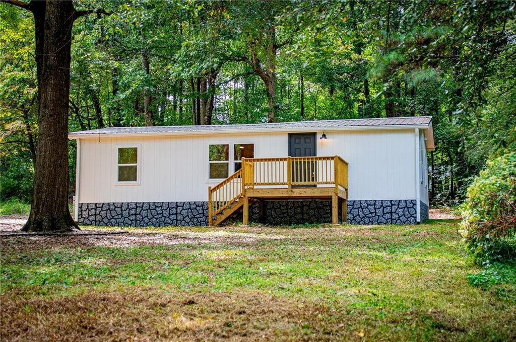 3 bedroom, 2 bathroom, 1,056 sq ft single family residence for sale at 77 Rock Springs Lake Drive, Carrollton, GA 30116 — photo 2