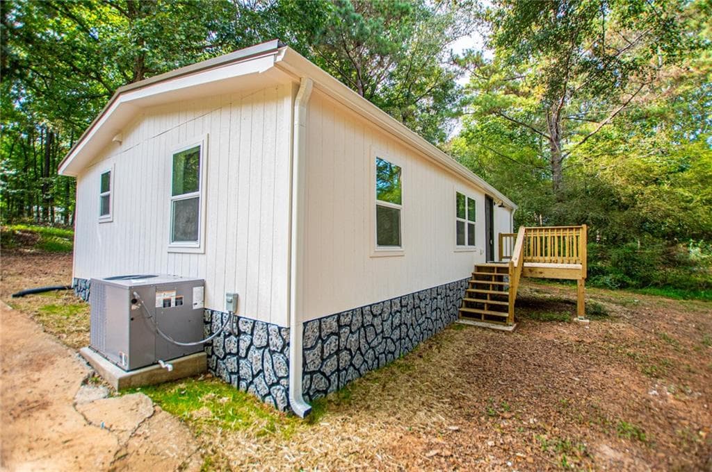 3 bedroom, 2 bathroom, 1,056 sq ft single family residence for sale at 77 Rock Springs Lake Drive, Carrollton, GA 30116 — photo 5